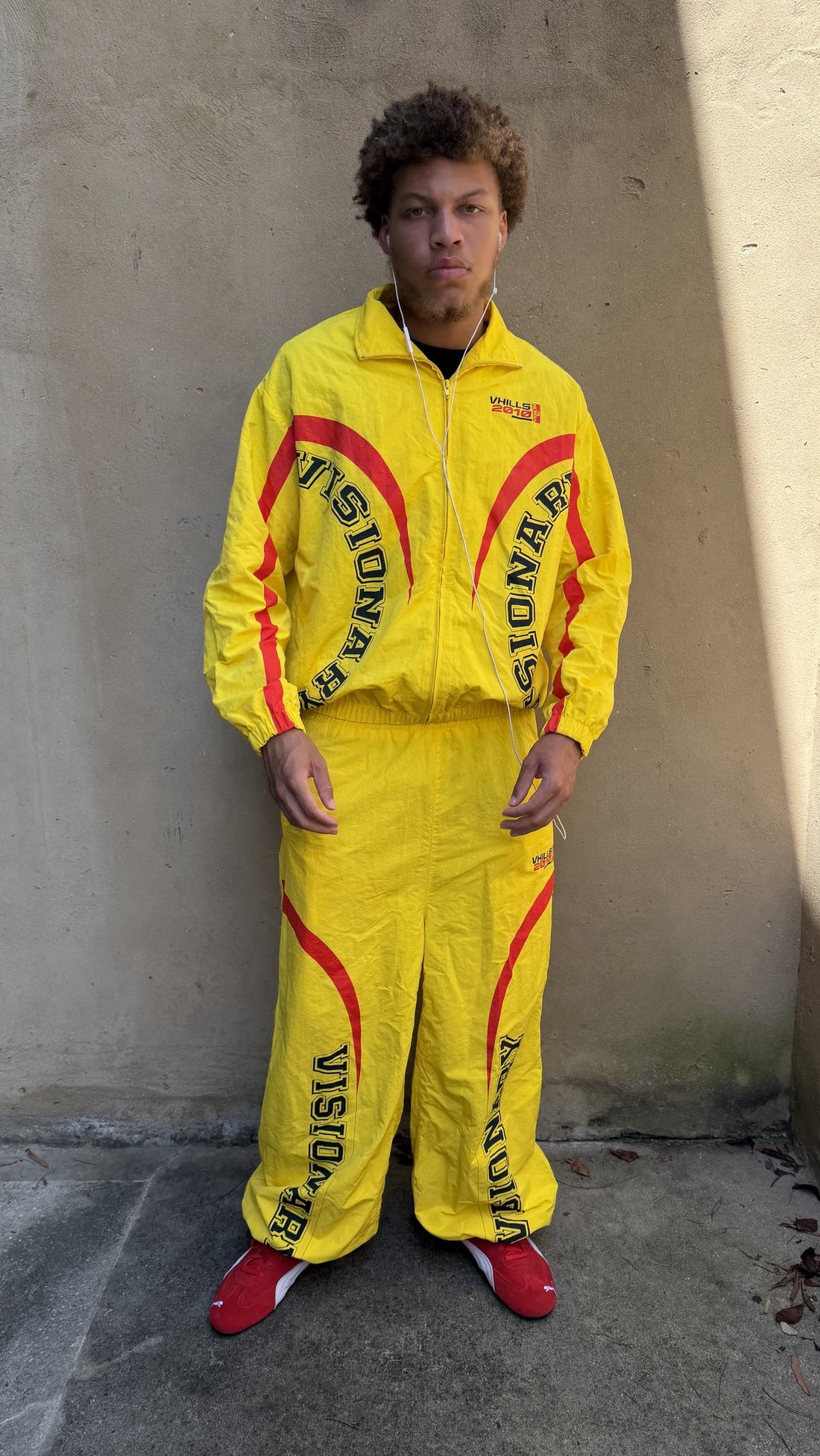 @shakurskii_ wearing Visionary Hills Light Tracksuit